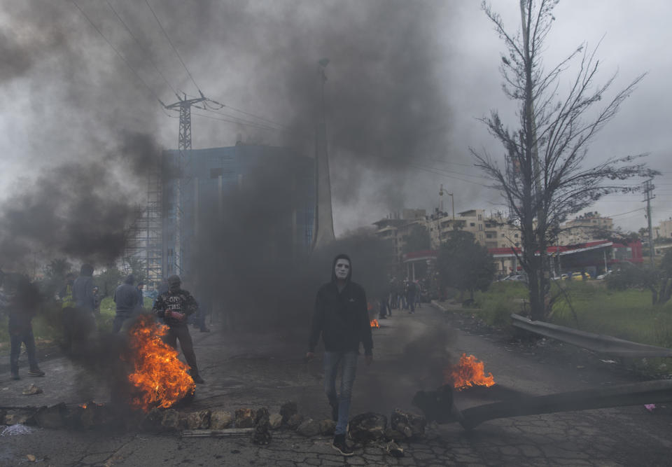 Palestinian protesters clash with Israeli troops following a protest to mark the Land Day in the West Bank city of Ramallah, Friday, March 30, 2018. (AP Photo/Nasser Nasser)