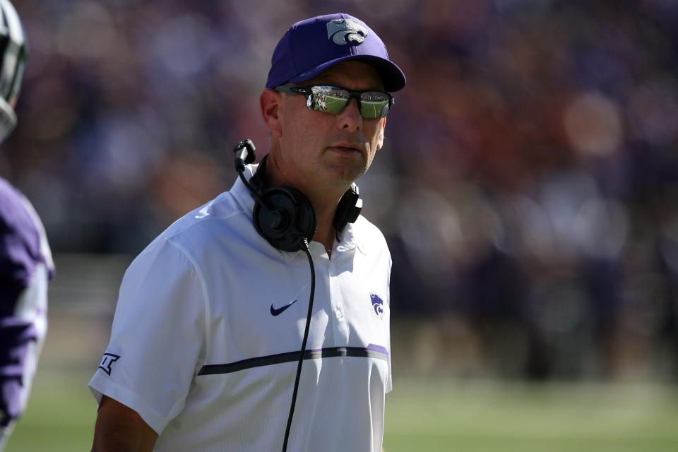 Kansas State associate head coach Sean Snyder looks toward the sideline during a game against Texas in 2016.