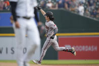 Arizona Diamondbacks' Corbin Carroll rounds the bases after his solo home run during the first inning of a baseball game against the Detroit Tigers, Friday, June 9, 2023, in Detroit. (AP Photo/Carlos Osorio)