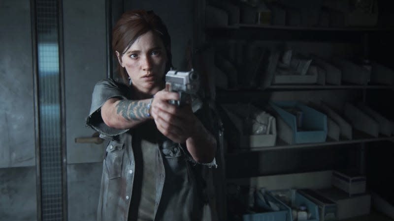 Ellie aims a gun at someone off camera.