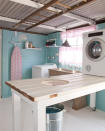 Transform a corner into a functional laundry space. Paint the walls, track down a set of old concrete tubs and make a table, too. For hanging space, screw an old timber ladder to the roof – so handy, and rustic to boot!