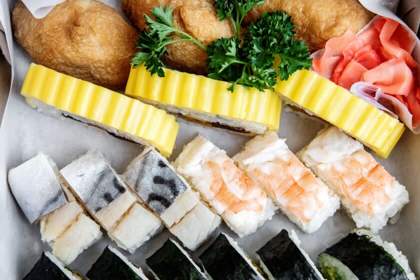 GARDENA, CA - APRIL 20: An assortment of sushi offered at Sakae Sushi on Thursday, April 20, 2023 in Gardena, CA. The menu includes: Tamago-maki, Ebi, California roll, Nori-maki, Saba, and Inari. (Mariah Tauger / Los Angeles Times)