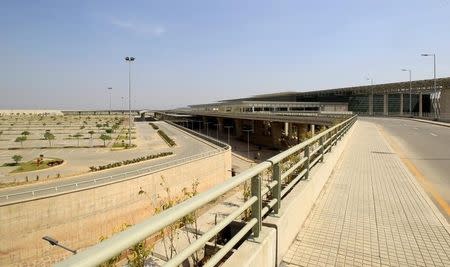 A general view of the parking area and the terminal building of the newly built airport in Islamabad, Pakistan May 6, 2017. REUTERS/Caren Firouz