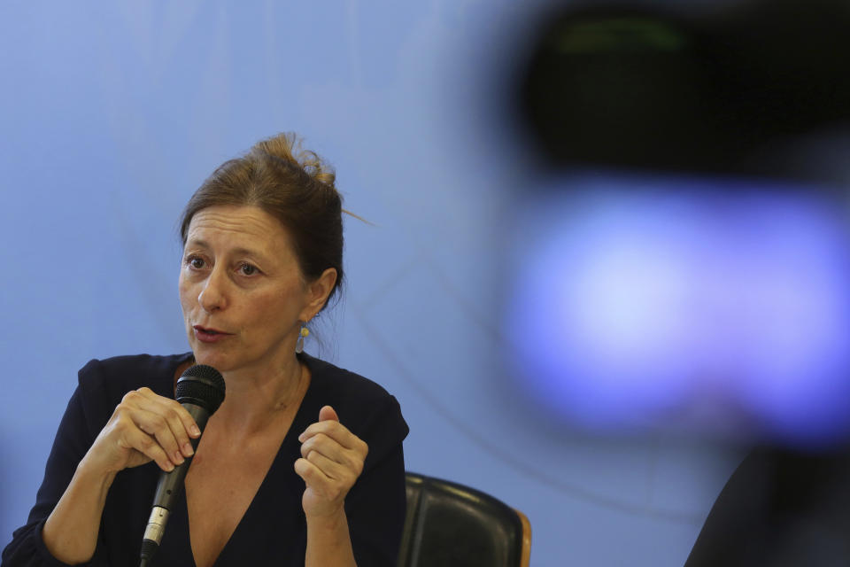 Head of the UNESCO emergency mission, Cristina Menegazzi, speaks during a press conference about the major fire in Rio's National Museum, at the representation's headquarters, in Brasilia, Brazil, Tuesday, Spet. 18, 2018. UNESCO coordinates an emergency mission, consisting of specialists in recovery and reconstruction, who will support Brazil in the reconstruction work of the National Museum of Rio de Janeiro. (AP Photo/Eraldo Peres)