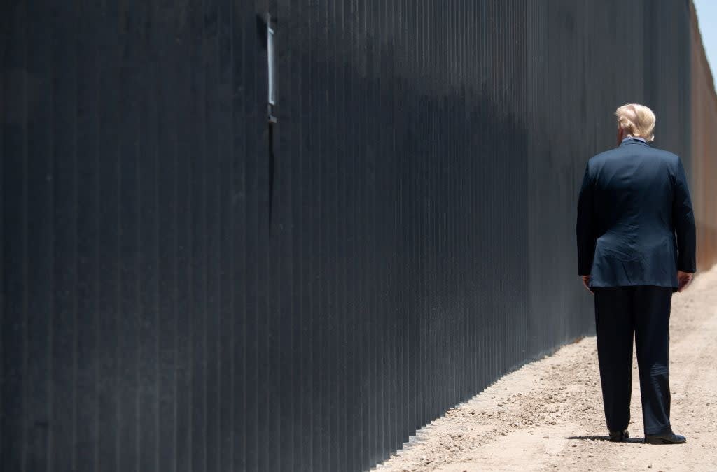 President Donald Trump participates in a ceremony commemorating the 200th mile of border wall at the international border with Mexico (AFP via Getty Images)