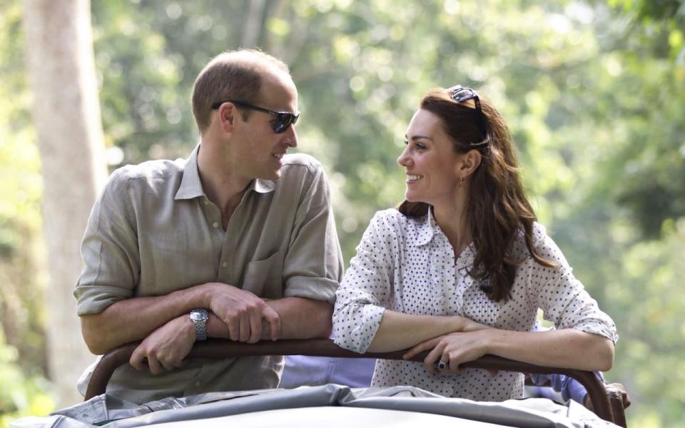 <p>The Duke and Duchess started the day with a Kaziranga safari, which called for some casual wear and Zara trousers for Kate. The mum-of-two had her Ray-Bans on hand and kept cool in a printed blouse. <i>[Photo: PA Images]</i></p>