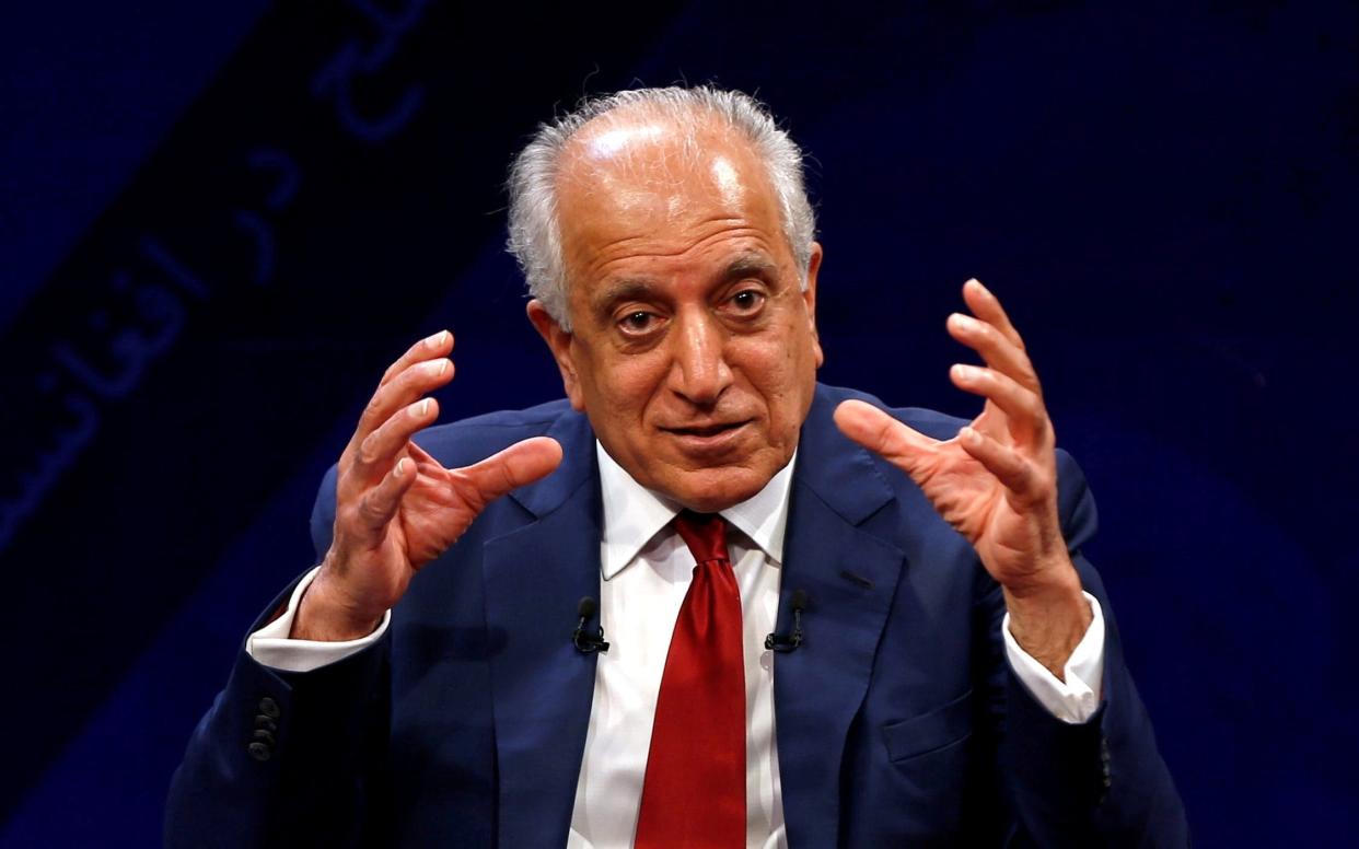 Zalmay Khalilzad met Mullah Abdul Ghani Baradar - REUTERS