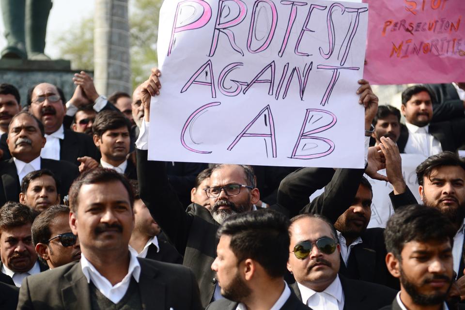 Advocates at the Allahabad High Court take part in a protest against India's new citizenship law in Allahabad on December 17, 2019. - Fresh protests against India's new citizenship law erupted December 17 as alleged police brutality fuelled fury against the legislation which critics say is anti-Muslim. (Photo by SANJAY KANOJIA / AFP) (Photo by SANJAY KANOJIA/AFP via Getty Images)