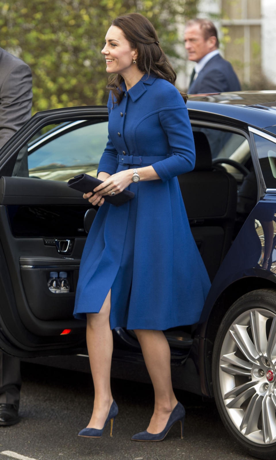 <p>For her <a rel="nofollow" href="https://uk.style.yahoo.com/duchess-of-cambridge-brings-back-90s-hair-trend-on-first-work-outing-of-2017-120744931.html" data-ylk="slk:first official appearance of the year;elm:context_link;itc:0;sec:content-canvas;outcm:mb_qualified_link;_E:mb_qualified_link;ct:story;" class="link  yahoo-link">first official appearance of the year</a>, the Duchess donned a royal blue coat by London luxe label Eponine. Kate finished the look with her trusty Rupert Sanderson blue pumps and twisted back locks of her hair with the ultimate 90s hair accessory: the butterfly clip. </p><p><i>[Photo: Getty]</i></p>