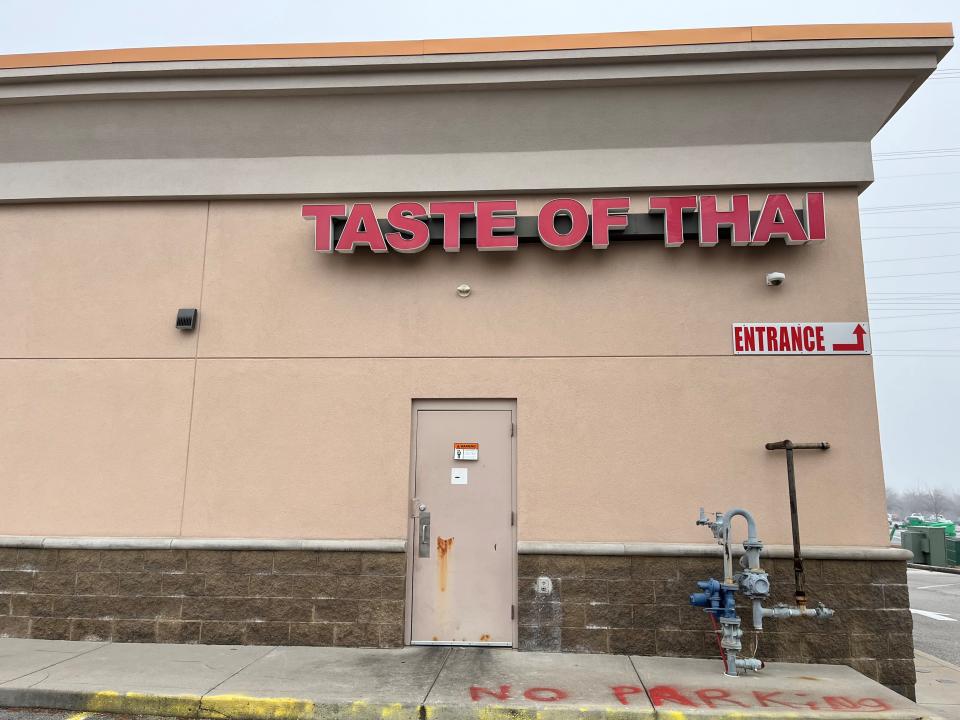 Signs remain on the empty Taste of Thai restaurant in Cedar Bluff on Jan. 10, 2023, following its recent closing.