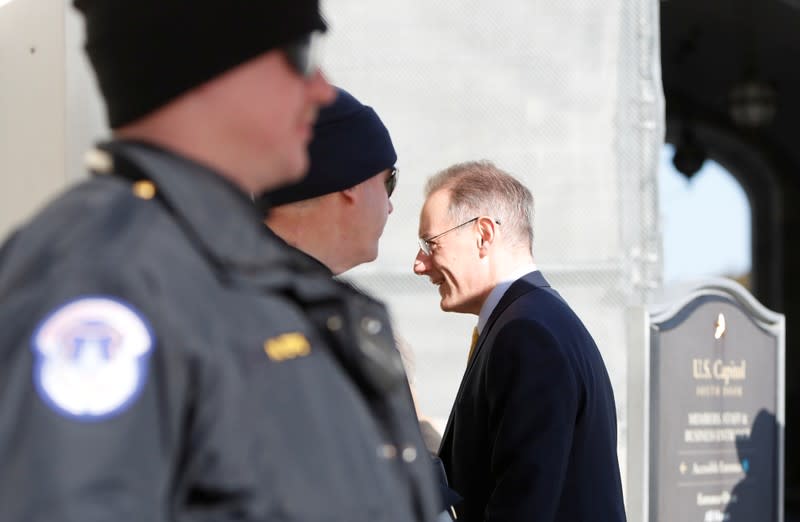 Mark Sandy, official of the Office of Management and Budget, arrives for a closed-door deposition as part of the House of Representatives impeachment inquiry into U.S. President Trump on Capitol Hill