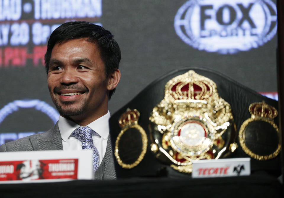 Manny Pacquiao smiles during a news conference Wednesday, July 17, 2019, in Las Vegas. Pacquiao is scheduled to fight Keith Thurman in a welterweight championship boxing match Saturday in Las Vegas. (AP Photo/John Locher)