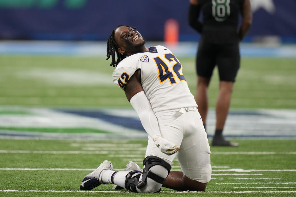 Toledo linebacker Jackson Barrow (42) reacts after the Mid-American Conference championship NCAA college football game against Ohio, Saturday, Dec. 3, 2022, in Detroit. Toledo won 17-7. AP Photo/Carlos Osorio)