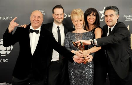 FILE PHOTO: Dragon's Den cast poses with award fro best reality series at the Canadian Screen Awards in Toronto