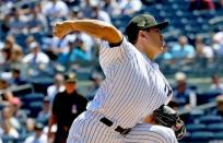 FILE PHOTO: May 18, 2019; Bronx, NY, USA; New York Yankees starting pitcher Masahiro Tanaka (19) delivers a pitch against the Tampa Bay Rays during the first inning at Yankee Stadium. Mandatory Credit: Andy Marlin-USA TODAY Sports