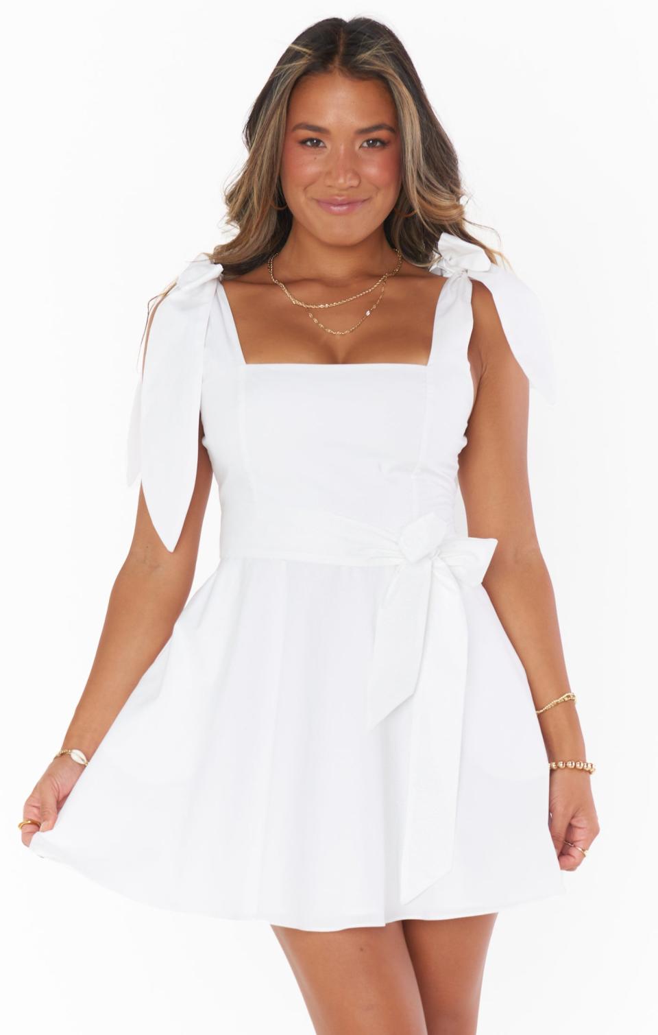 <p><a href="https://go.redirectingat.com?id=74968X1596630&url=https%3A%2F%2Fshowmeyourmumu.com%2Fproducts%2Fclaire-mini-dress-white-poplin%3Fvariant%3D40007100727339&sref=https%3A%2F%2Fwww.seventeen.com%2Ffashion%2Fstyle-advice%2Ftips%2Fg1012%2Fwhite-graduation-dresses%2F" rel="nofollow noopener" target="_blank" data-ylk="slk:Shop Now;elm:context_link;itc:0;sec:content-canvas" class="link ">Shop Now</a></p><p>Claire Mini Dress</p><p>$158.00</p><p>showmeyourmumu.com</p>