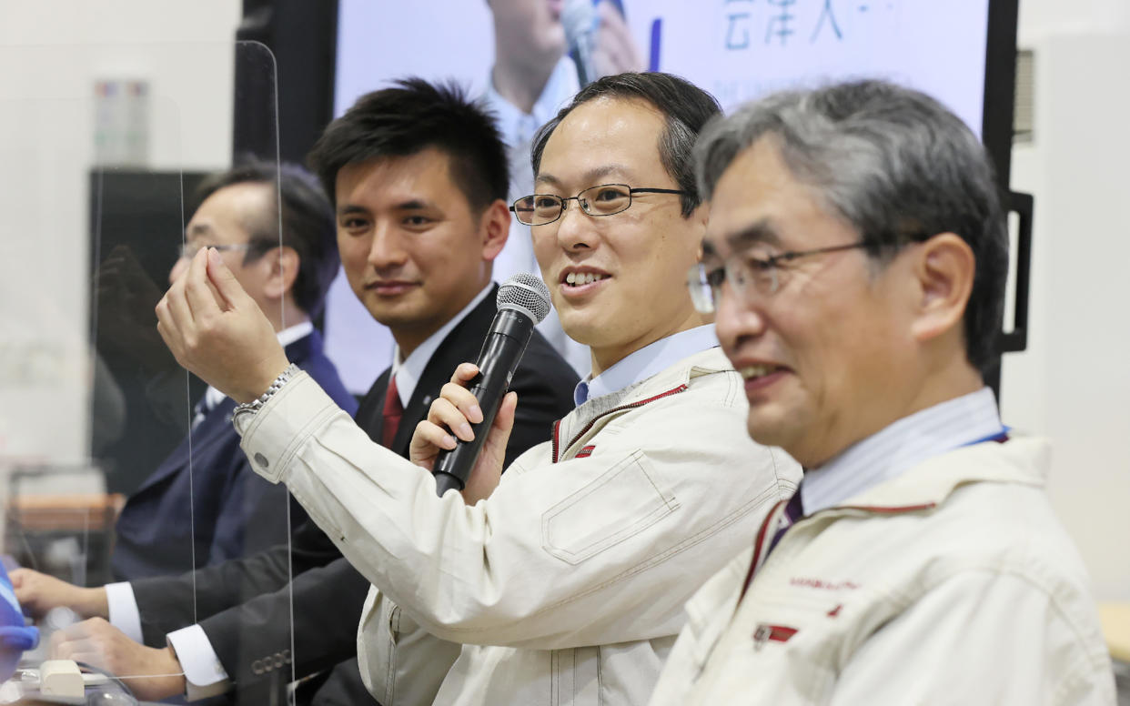 Yuichi Tsuda (2nd R), Hayabusa-2 project manager of the Japan Aerospace Exploration Agency (JAXA), speaks during a press conference at JAXA Sagamihara Campus in Sagamihara, Kanagawa prefecture on December 8, 2020, after a capsule containing samples taken from a distant asteroid arrived on Earth on December 6 after being dropped off by the Hayabusa-2 probe. (Photo by STR / JIJI PRESS / AFP) / Japan OUT (Photo by STR/JIJI PRESS/AFP via Getty Images)