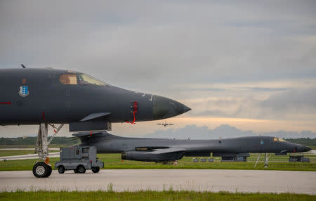 A U.S. Air Force B-1B Lancer assigned to the 37th Expeditionary Bomb Squadron, prepare for take-off to fly a bilateral mission with Japanese and South Korea Air Force jets in the vicinity of the Sea of Japan, from Andersen Air Force Base, Guam, October 10, 2017. Staff Sgt. Joshua Smoot/U.S. Air Force/Handout via REUTERS