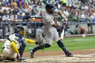 Houston Astros' Corey Julks hits a single during the fourth inning of a baseball game against the Milwaukee Brewers Monday, May 22, 2023, in Milwaukee. (AP Photo/Morry Gash)