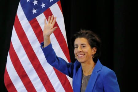 FILE PHOTO:  Democratic candidate for Rhode Island Governor Gina Raimondo takes the stage for a campaign rally with United States first lady Michelle Obama in Providence, Rhode Island October 30, 2014.   REUTERS/Brian Snyder/File Photo