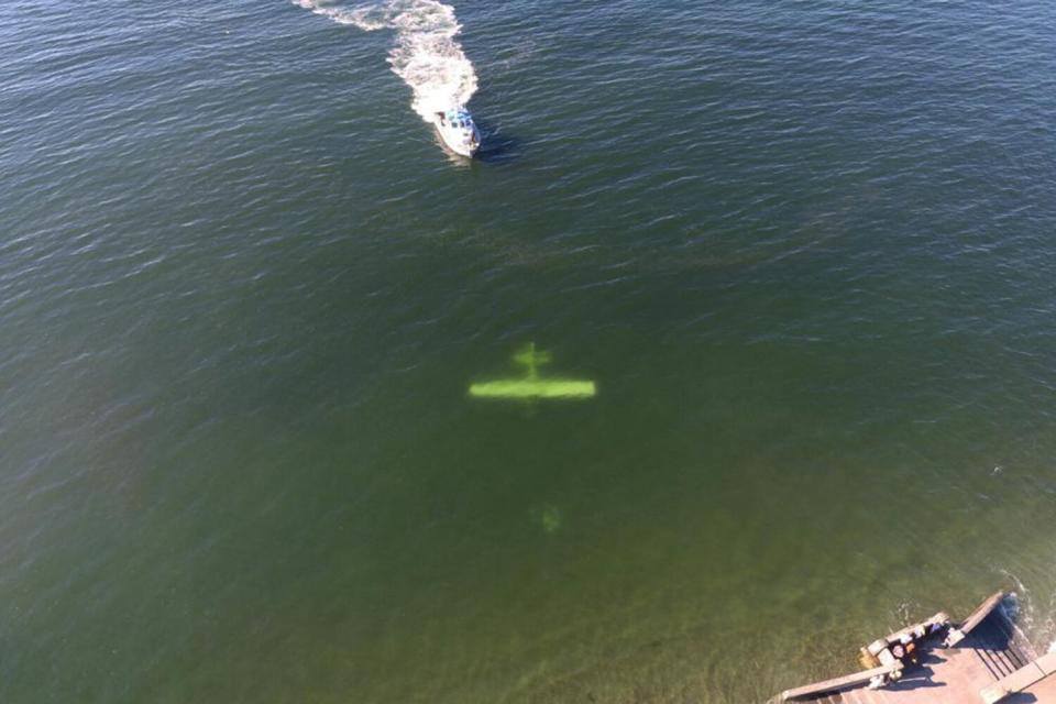 The Coast Guard responds to a plane that crashed in the Puget Sound near Alki Point in Seattle July 26, 2022. The person aboard the plane reportedly swam to shore in stable condition.