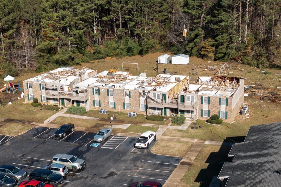 This aerial image shows roof damage to the Sagewood Apartments after an apparent tornado, Wednesday, Nov. 30, 2022, in Eutaw, Alabama (AP)