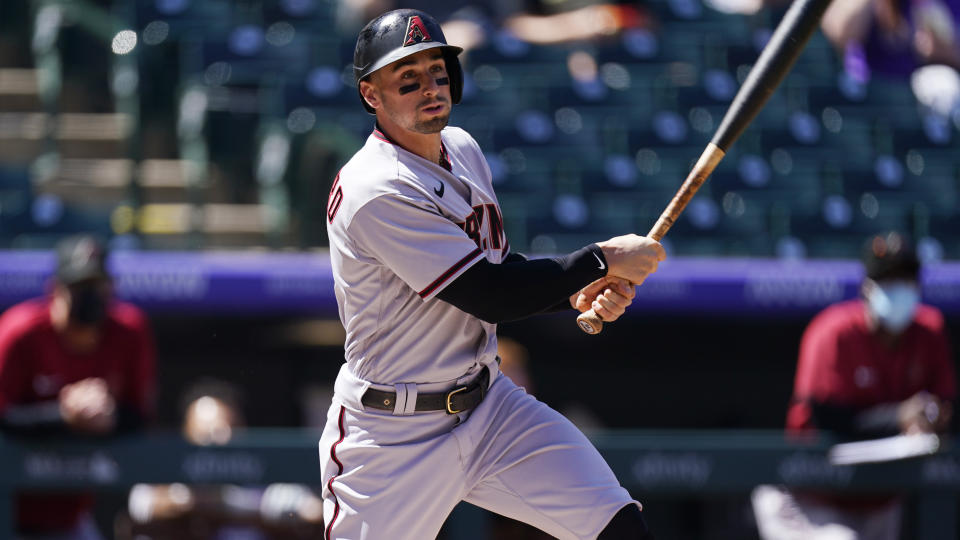 Arizona Diamondbacks left fielder Tim Locastro (16) in the first inning of a baseball game Thursday, April 8, 2021, in Denver. (AP Photo/David Zalubowski)