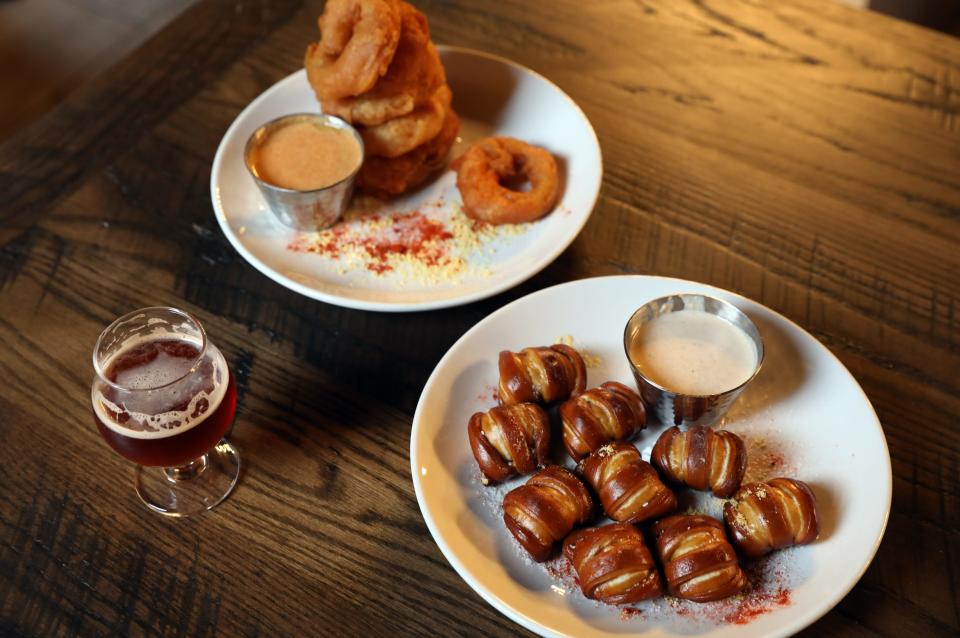 Pretzel bites and beer battered onion rings with beer cheese at Argonne Rose Brewing Co. in Mohegan Lake Dec. 19, 2022.