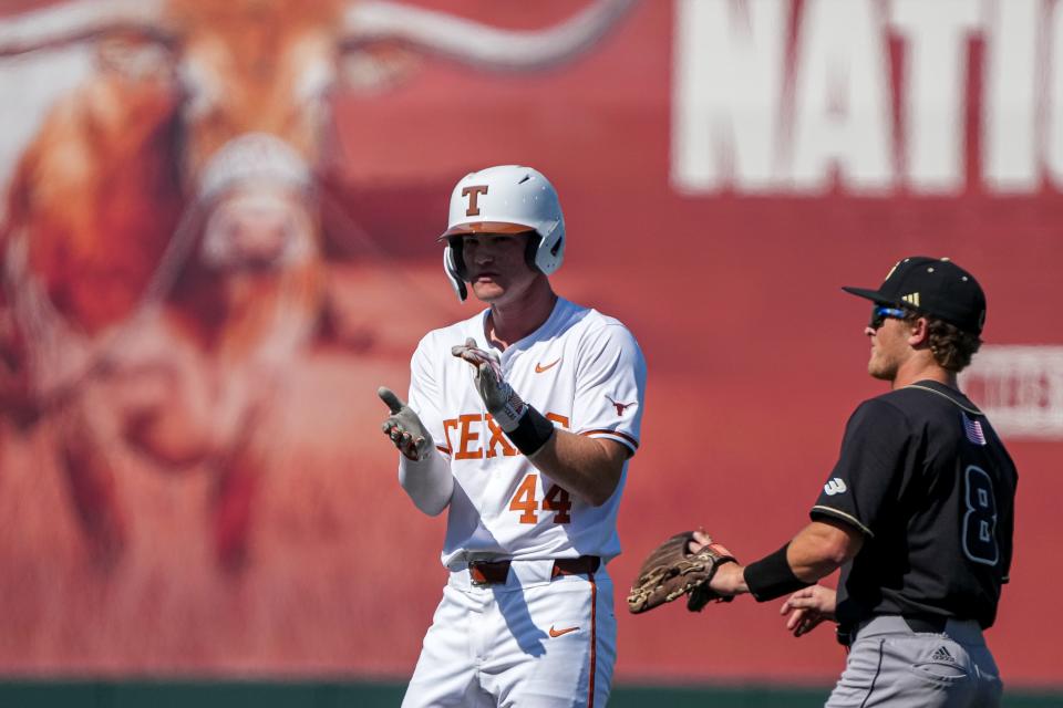 Texas Longhorns outfielder Max Belyeu celebrates a hit during the game against Cal Poly at UFCU Disch–Falk Field on Feb. 24.