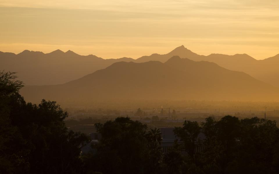 Air pollution spreads over the Valley.