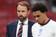 COPENHAGEN, DENMARK - SEPTEMBER 08: England manager Gareth Southgate looks on with Trent Alexander-Arnold after the UEFA Nations League group stage match between Denmark and England at Parken Stadium on September 08, 2020 in Copenhagen, Denmark. (Photo by Michael Regan/Getty Images)