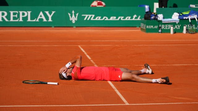 Stefanos Tsitsipas reacts after winning the second set