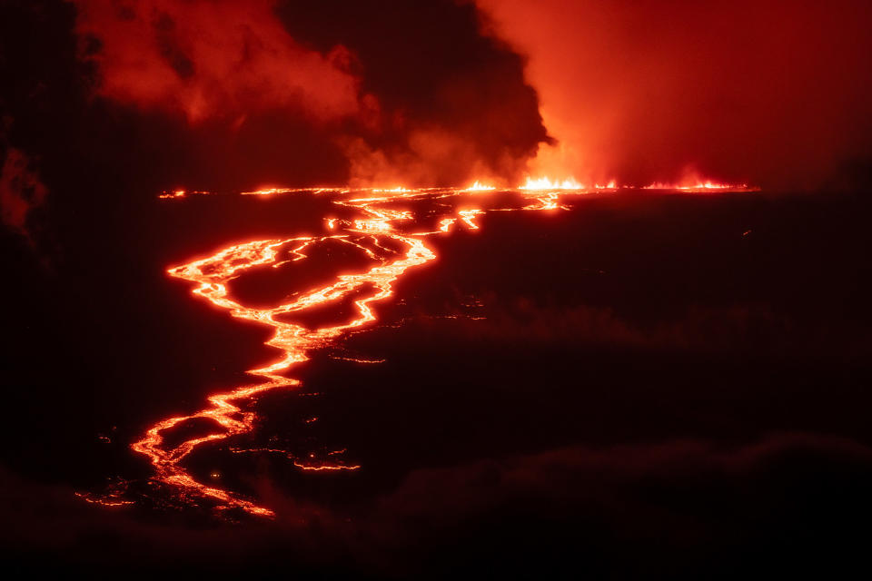 An image of Hawaii's Mauna Loa volcano erupting