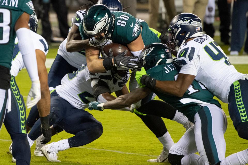 Eagles' Dallas Goedert (88) fights for yards against the Seahawks Monday, Nov. 30, 2020 in Philadelphia.