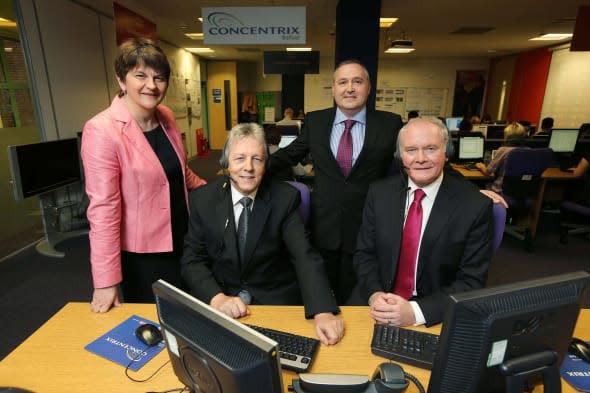 First Minister Peter Robinson MLA and the deputy First Minister Martin McGuinness MLA with Enterprise Minister Arlene Foster and Senior VP of Concentrix Philip Cassidy, after they announced that Concentrix, a US business services company, is to create more than 1,000 new jobs in Belfast. PRESS ASSOCIATION Photo. Issue date: Thursday April 10, 2014. The company, which already employs 800 workers in the city, is investing Â£36 million to expand its operations. See PA story ULSTER Jobs. Photo credit should read: Kelvin Boyes/Press Eye /PA WireNOTE TO EDITORS: This handout photo may only be used in for editorial reporting purposes for the contemporaneous illustration of events, things or the people in the image or facts mentioned in the caption. Reuse of the picture may require further permission from the copyright holder.