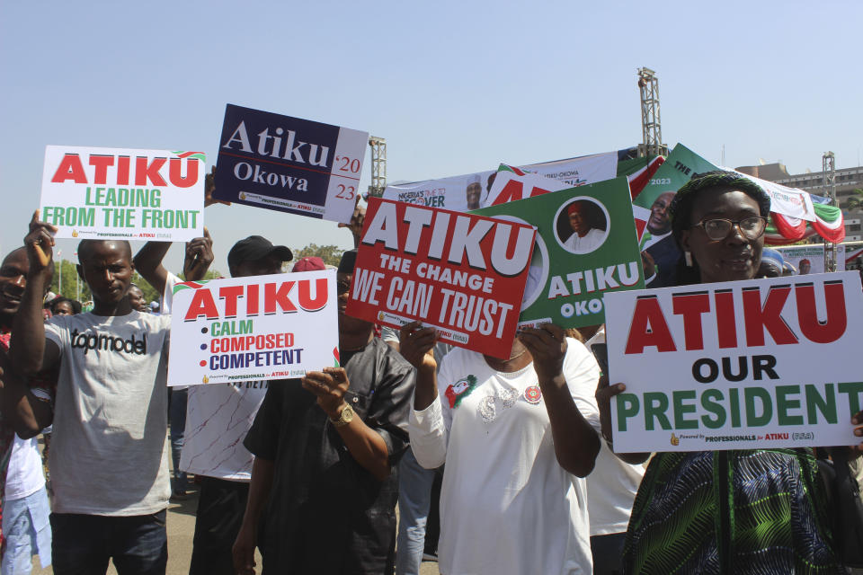 FILE - Supporters of Atiku Abubakar, presidential candidate of the People's Democratic party, Nigeria's opposition party, attends an election campaign ahead of 2023 Presidential elections in Abuja, Nigeria, on Dec. 10, 2022. Fueled by high unemployment and growing insecurity, younger Nigerians are mobilizing in record numbers to take part in this month's presidential election. (AP Photo/Gbemiga Olamikan, File)