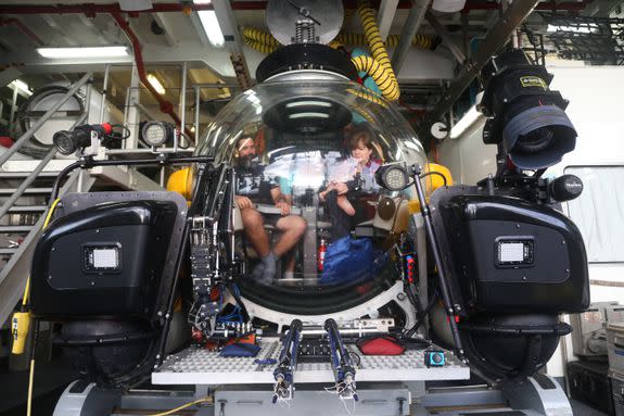 Marine Scientists Edie Widder (R) and Dean Grubbs (L) prepare to descend into the Caribbean Sea.