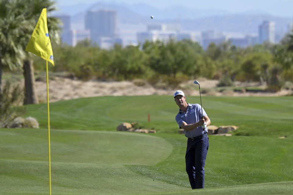 Harris English takes his third shot on the 13th hole during first round of the CJ Cup golf tournament Thursday, Oct. 14, 2021, in Las Vegas. (AP Photo/David Becker)