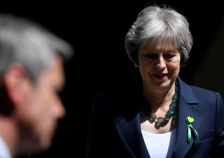 Britain's Prime Minister Theresa May leaves Downing Street for the Houses of Parliament in London, Britain, June 13, 2018. REUTERS/Toby Melville