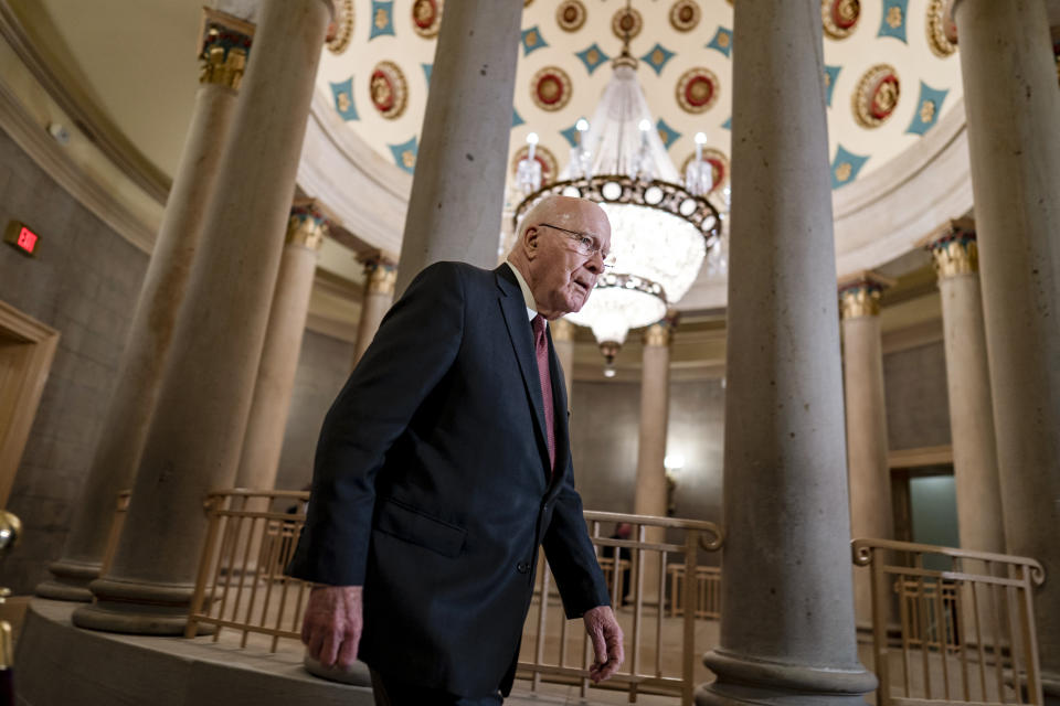 Sen. Patrick Leahy, D-Vt., the president pro temper of the Senate, walk through an ornate corridor at the Capitol in Washington, Monday, Dec. 19, 2022. The U.S. Senate's longest-serving Democrat, Leahy is getting ready to step down after almost 48 years representing his state in the U.S. Senate. (AP Photo/J. Scott Applewhite)