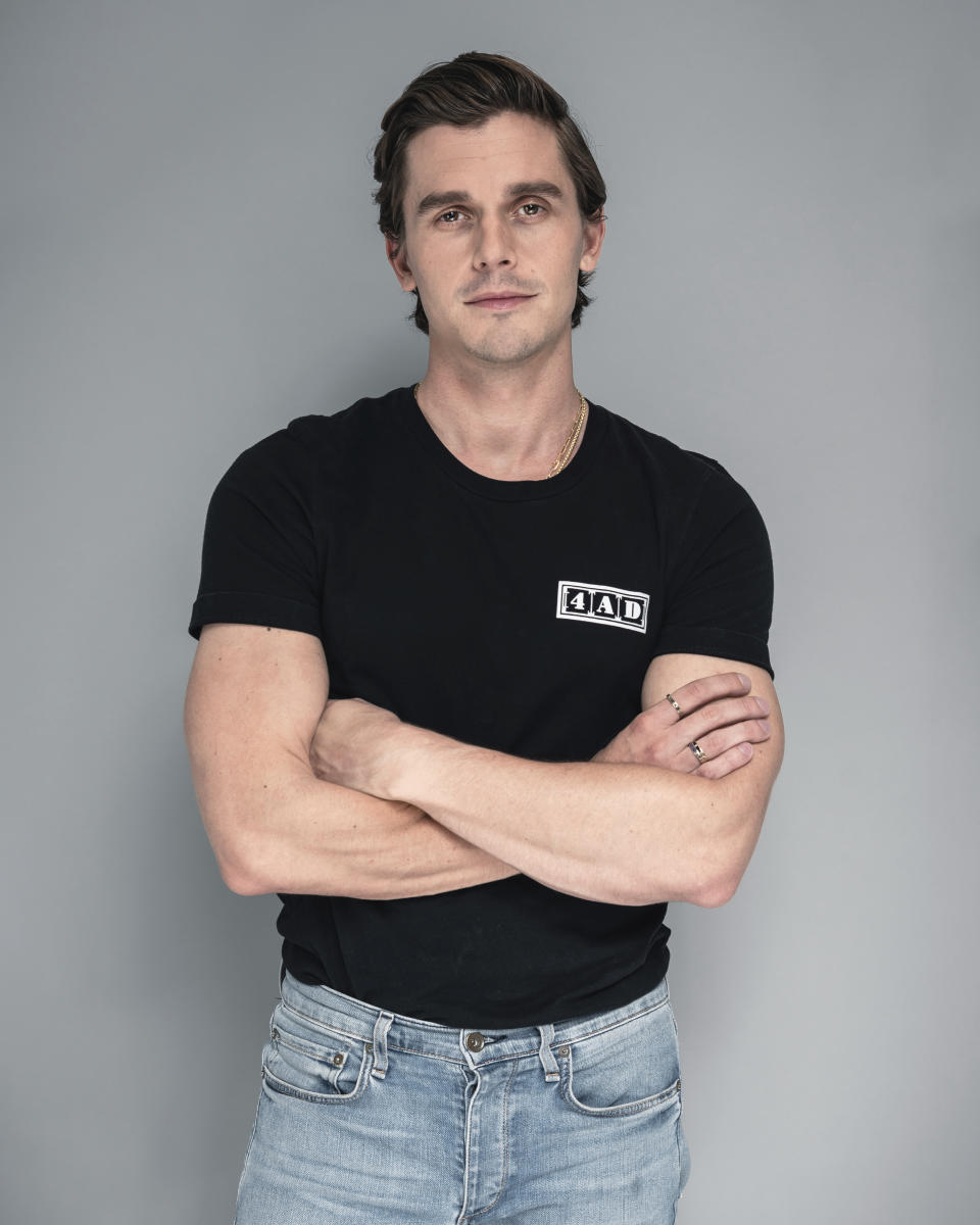 This July 31, 2019 photo shows Antoni Porowski, a cast member in the Netflix series "Queer Eye," posing for a portrait in New York to promote his new cookbook "Antoni in the Kitchen." (Photo by Christopher Smith/Invision/AP)