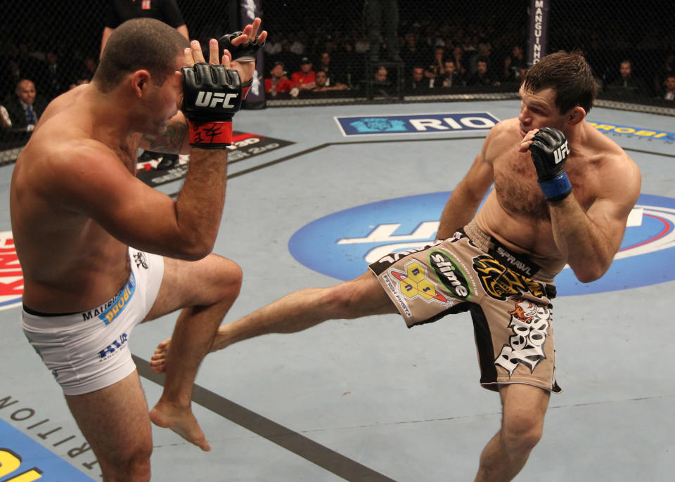 Forrest Griffin kicks Mauricio 'Shogun' Rua during a light heavyweight bout at UFC 134 at HSBC Arena on August 27, 2011 in Rio de Janeiro, Brazil. (Photo by Al Bello/Zuffa LLC/[Zuffa LLC via Getty Images)