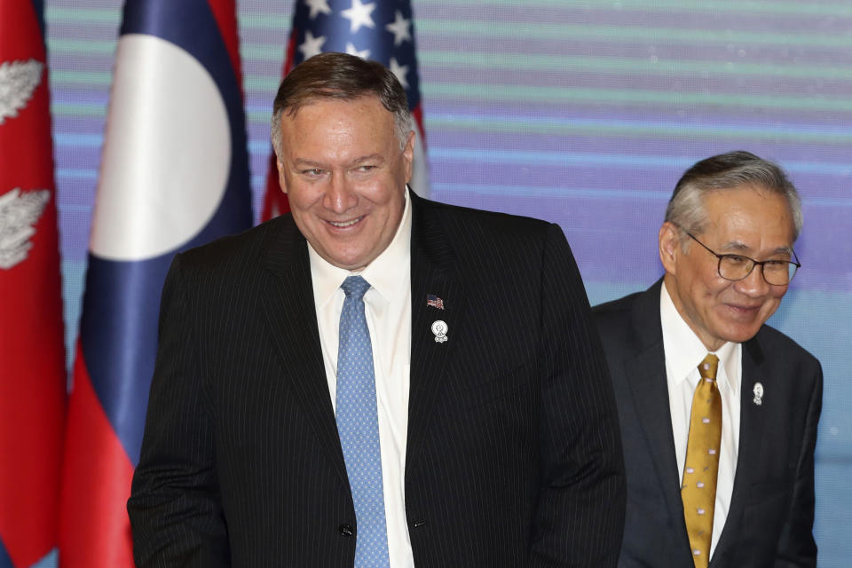 FILE - In this Aug. 1, 2019, file photo, U.S. Secretary of State Mike Pompeo, left, and Thailand's Foreign Minister Don Pramudwinai, get ready for ASEAN-U.S. meeting on the sidelines of the Association of Southeast Asian Nations (ASEAN) Foreign Ministers' meeting in Bangkok, Thailand. Pompeo says Washington isn't asking any Asian nation to take sides as it engages with the region where China is battling for influence and aggressively expanding territorial claims in the South China Sea. (AP Photo/Sakchai Lalit, File)