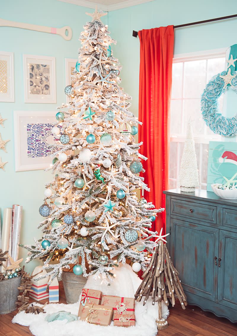 <p>Whether you're spending your holiday by the seashore or want to bring some of that beach beauty inland, your Christmas tree is the perfect place to show off your <a href="https://www.amazon.com/Tropical-Seashell-Christmas-Ornaments-Turquoise/dp/B072WK16CD?tag=syn-yahoo-20&ascsubtag=%5Bartid%7C10050.g.1251%5Bsrc%7Cyahoo-us" rel="nofollow noopener" target="_blank" data-ylk="slk:collection of shells;elm:context_link;itc:0;sec:content-canvas" class="link ">collection of shells</a>. Finish the look with <a href="https://www.amazon.com/AUXO-FUN-shatterproof-Christmas-Ornaments-Decoration/dp/B07FD2ZVDP/ref=sr_1_1?dchild=1&keywords=turquoise+ornaments&qid=1603204779&sr=8-1&tag=syn-yahoo-20&ascsubtag=%5Bartid%7C10050.g.1251%5Bsrc%7Cyahoo-us" rel="nofollow noopener" target="_blank" data-ylk="slk:turquoise ornaments;elm:context_link;itc:0;sec:content-canvas" class="link ">turquoise ornaments</a> and <a href="https://www.amazon.com/Nautical-Crush-Trading-Knobby-Starfish/dp/B01N5CXAU4/?tag=syn-yahoo-20&ascsubtag=%5Bartid%7C10050.g.1251%5Bsrc%7Cyahoo-us" rel="nofollow noopener" target="_blank" data-ylk="slk:starfish tree topper;elm:context_link;itc:0;sec:content-canvas" class="link ">starfish tree topper</a>.</p><p><strong>Get the tutorial at <a href="http://www.craftsbycourtney.com/my-coastal-christmas-treetopia-design-council-2016/" rel="nofollow noopener" target="_blank" data-ylk="slk:Crafts by Courtney;elm:context_link;itc:0;sec:content-canvas" class="link ">Crafts by Courtney</a>.</strong></p><p><a class="link " href="https://www.amazon.com/Sea-Shells-Mixed-Beach-Seashells/dp/B00XM1HOBC/?tag=syn-yahoo-20&ascsubtag=%5Bartid%7C10050.g.1251%5Bsrc%7Cyahoo-us" rel="nofollow noopener" target="_blank" data-ylk="slk:SHOP SEASHELLS;elm:context_link;itc:0;sec:content-canvas">SHOP SEASHELLS</a></p>