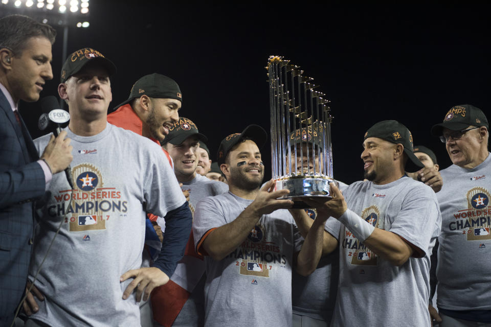 LOS ANGELES, CA - NOVEMBER 01: The Houston Astros, including Jose Altuve, center, celebrate after defeating the Los Angeles Dodgers 5-1 in Game 7 of the World Series at Dodger Stadium in Los Angeles, CA on Wednesday, November 1, 2017. (Photo by Kevin Sullivan/Digital First Media/Orange County Register via Getty Images)