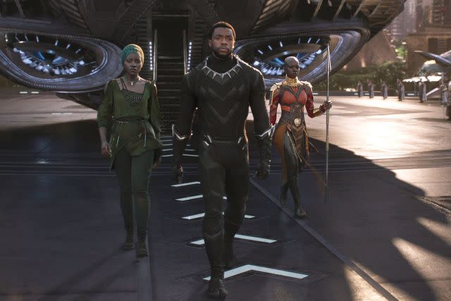 <p>Marvel/Disney/Kobal/Shutterstock</p> Lupita Nyong'o (left), Chadwick Boseman and Danai Gurira in Black Panther.