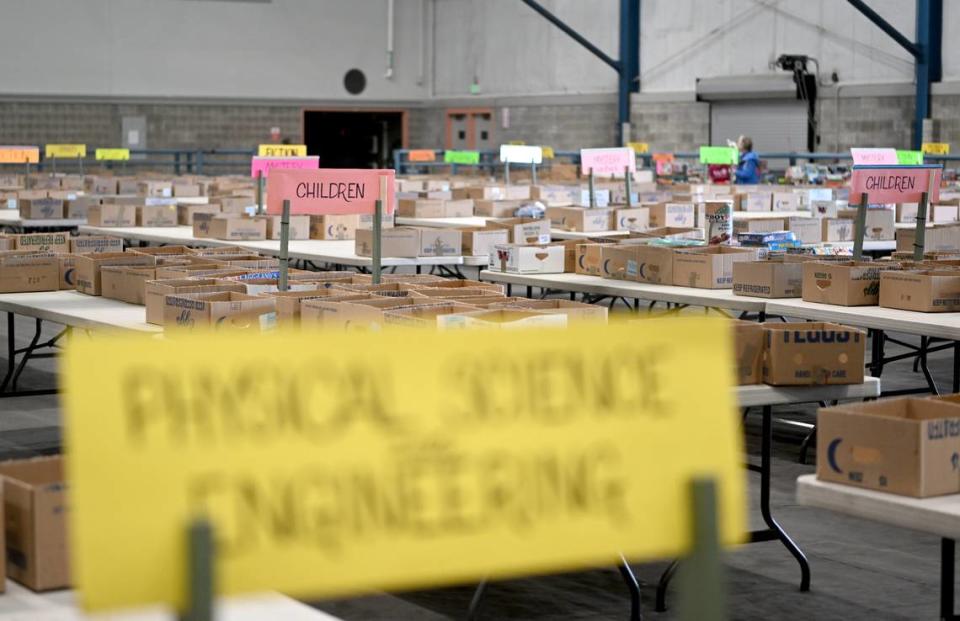 Set up for the AAUW used book sale at the Penn State Snider Agriculture Arena on Thursday, May 11, 2023.