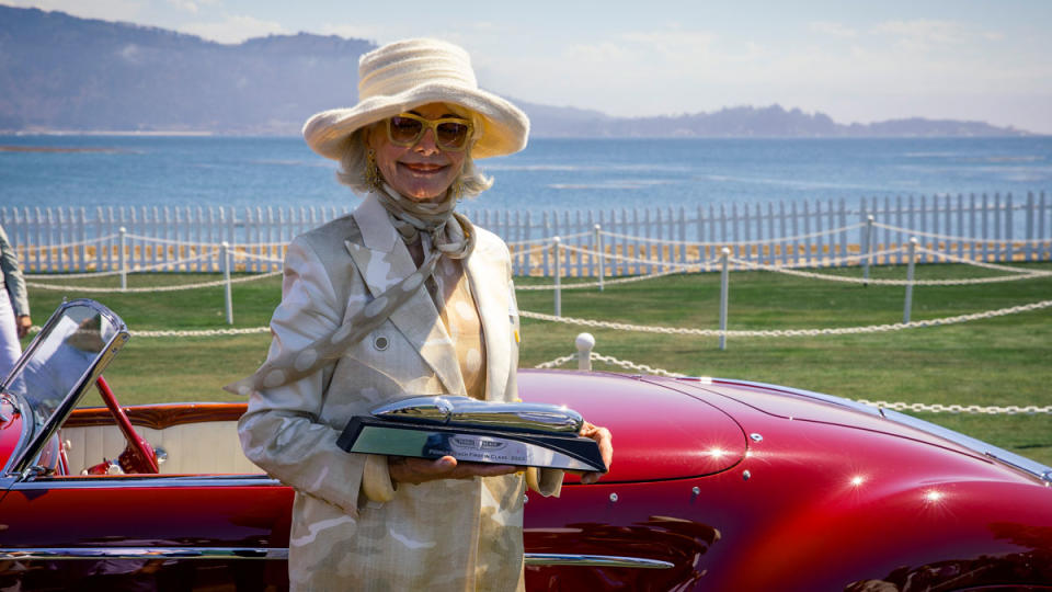 Merle Mullin poses with her class-winning Delahaye at the Pebble Beach Concours d'Elegance.