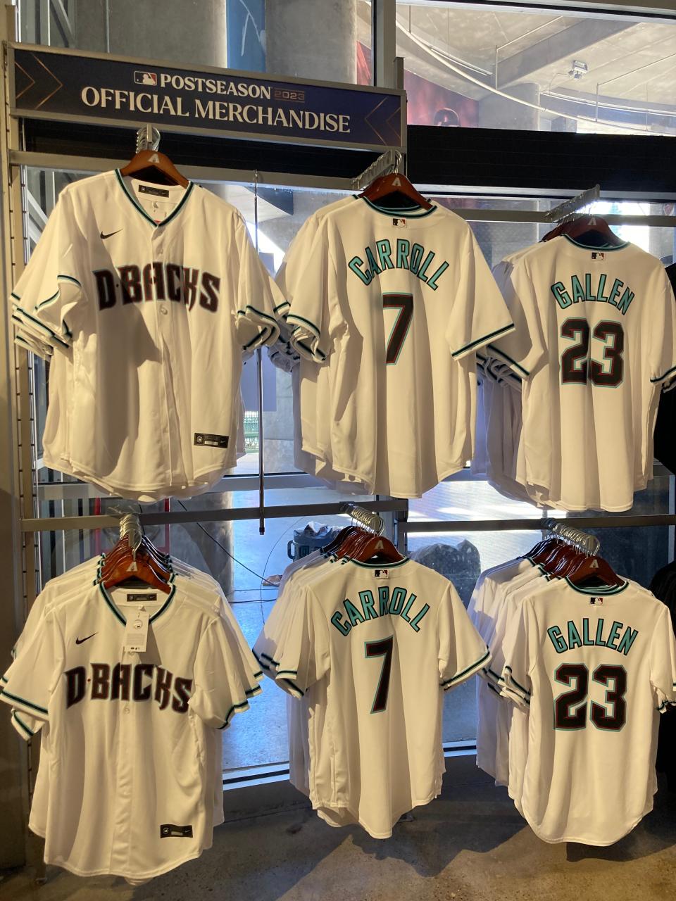 Several Corbin Carroll and Zac Gallen jerseys are on display at Diamondbacks Team Shop at Chase Field.