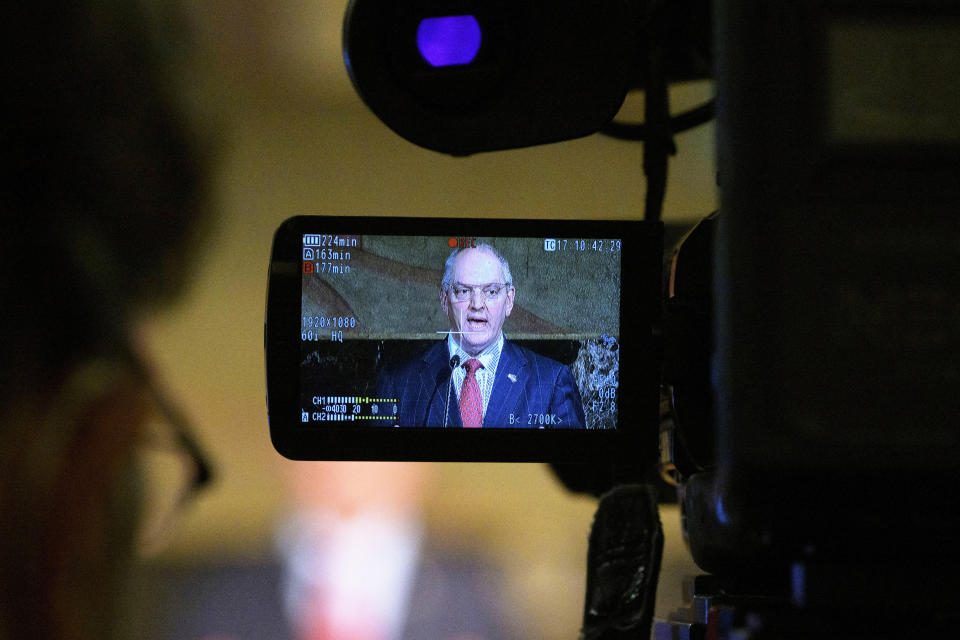 FILE - Louisiana Gov. John Bel Edwards speaks about the investigation into the death of Ronald Greene in Baton Rouge, La., Tuesday, Feb. 1, 2022. (AP Photo/Matthew Hinton, File)